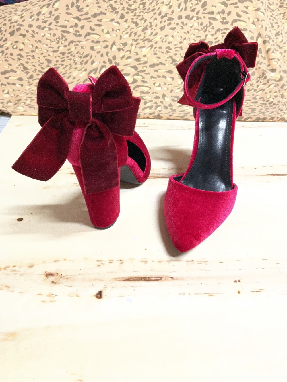 Light burgundy velvet heels with large ankle bow